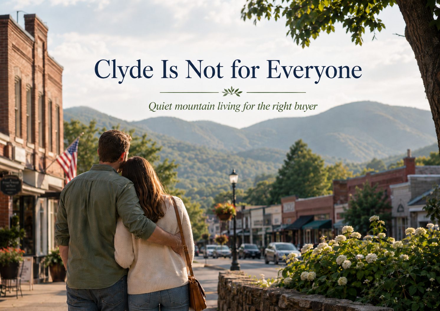 Couple overlooking downtown Clyde NC with mountain views, small town streets, and quiet mountain living for the right homebuyer.